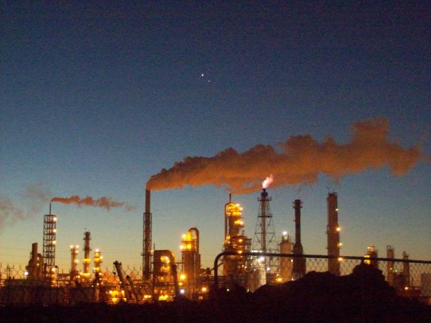 Venus and Jupiter above an industrial complex in Texas